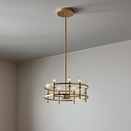A modern gold dual-ring candelabra chandelier hanging from a ceiling with vertical support rods and candle-style bulbs.